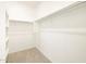 Spacious walk-in closet with double hanging rods and shelving at 2659 E San Miguel Dr, Casa Grande, AZ 85194