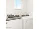 Laundry room with Whirlpool washer and dryer at 2659 E San Miguel Dr, Casa Grande, AZ 85194