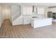 Bright kitchen showcases stainless steel appliances, an island and ample cabinet space at 2428 W Rowel Rd, Phoenix, AZ 85085