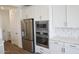 Gleaming stainless steel appliances are complemented by sleek white cabinetry and elegant countertops at 2428 W Rowel Rd, Phoenix, AZ 85085