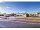 Charming single-story home with a low-maintenance desert landscaped front yard at 10619 W Clair Dr, Sun City, AZ 85351