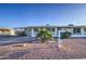 Charming single-story home featuring desert landscaping and solar panels for energy efficiency at 10619 W Clair Dr, Sun City, AZ 85351