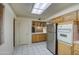 Functional kitchen featuring stainless steel appliances and ample cabinet space for storage at 10619 W Clair Dr, Sun City, AZ 85351