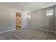 Bedroom with carpet and a walk-in shower bathroom view at 31969 N 117Th Ave, Peoria, AZ 85383