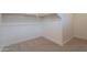 Practical walk-in closet space with shelves and clothing racks providing ample storage solutions at 31985 N 117Th Ave, Peoria, AZ 85383