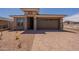 Charming single-story home with a two-car garage, brick accents, and low-maintenance landscaping at 32018 N 117Th Ave, Peoria, AZ 85383