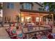 Outdoor living space with comfortable seating, a covered patio, and stylish decor at 1201 W Washington Ave, Gilbert, AZ 85233