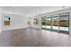 Spacious living room with multiple windows and sliding doors providing ample natural light at 1329 W Via De Olivos Dr, San Tan Valley, AZ 85140