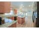 Charming kitchen with granite countertops and modern appliances at 695 W Estrella Dr, Gilbert, AZ 85233