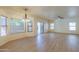 Bright and airy living room with large windows and seamless flooring at 695 W Estrella Dr, Gilbert, AZ 85233