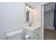 Bright bathroom features a white vanity, modern fixtures, and a framed mirror for a clean, updated look at 3801 E Captain Dreyfus Ave, Phoenix, AZ 85032