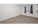 Cozy bedroom with soft carpet and a window at 3801 E Captain Dreyfus Ave, Phoenix, AZ 85032