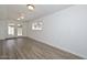 Bright living room featuring light-colored walls and floors at 3801 E Captain Dreyfus Ave, Phoenix, AZ 85032