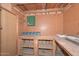 This garage space offers pegboard, shelves and a workbench for all your projects at 3801 E Captain Dreyfus Ave, Phoenix, AZ 85032