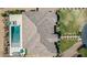 Aerial shot of backyard, featuring pool and outdoor space on a large manicured lot at 19575 E Vallejo St, Queen Creek, AZ 85142