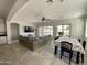 Spacious living room next to the dining area, with access to the backyard patio at 4142 E Zion Pl, Chandler, AZ 85249