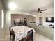 Open-concept living space featuring a large sectional sofa and dining area, perfect for entertaining and relaxation at 4142 E Zion Pl, Chandler, AZ 85249