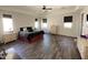 Main bedroom features hardwood floors, natural light from several windows, and ample space for furnishings at 4142 E Zion Pl, Chandler, AZ 85249