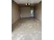 Attached garage offers painted walls, sealed floor and backyard access door at 19202 N Signal Butte Cir, Sun City, AZ 85373