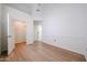 Spacious bedroom with wood-look floors and a large closet at 4525 N 22Nd St # 404, Phoenix, AZ 85016
