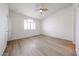 Bedroom with ceiling fan and light wood floors at 4525 N 22Nd St # 404, Phoenix, AZ 85016