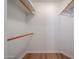 Walk-in closet featuring ample storage and wooden closet rods at 4525 N 22Nd St # 404, Phoenix, AZ 85016