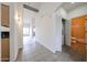 Hallway view with a bathroom and laundry closet at 4525 N 22Nd St # 404, Phoenix, AZ 85016