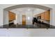 Modern kitchen view features sleek countertops, wooden cabinets, and appliances at 4525 N 22Nd St # 404, Phoenix, AZ 85016