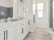 Simple bathroom with white vanity and shower/tub combo at 23120 W Skinner Rd, Wittmann, AZ 85361