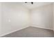 Simple bedroom with carpeted floor and ceiling fan at 23120 W Skinner Rd, Wittmann, AZ 85361