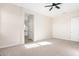 Spacious bedroom with access to bathroom and closet at 23120 W Skinner Rd, Wittmann, AZ 85361
