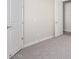 Bright bedroom with neutral walls and grey carpet at 23120 W Skinner Rd, Wittmann, AZ 85361