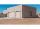 View of the home's exterior and garage at 23120 W Skinner Rd, Wittmann, AZ 85361