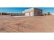 Home exterior view from across the lot at 23120 W Skinner Rd, Wittmann, AZ 85361