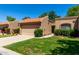 Inviting home with a well-manicured lawn, desert landscaping, and an attached two-car garage at 9502 W Mcrae Way, Peoria, AZ 85382