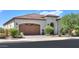 Charming single-story home featuring a beautiful tile roof and a spacious two-car garage at 35532 N Sunset Trl, San Tan Valley, AZ 85140