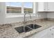 Double stainless steel sink with modern faucet at 3810 N Mateo Dr, Eloy, AZ 85131