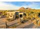 Luxury home with circular driveway and desert landscaping at 9701 E Happy Valley Rd # 10, Scottsdale, AZ 85255