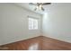 Bedroom with wood flooring and window with blinds at 1718 W Colter St # 195, Phoenix, AZ 85015