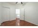 Spacious bedroom with wood floors and double doors to loft at 1718 W Colter St # 195, Phoenix, AZ 85015