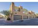 Two-story building with multiple garages and landscaping at 1718 W Colter St # 195, Phoenix, AZ 85015