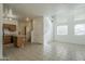 Open floor plan combining kitchen and living room areas at 1718 W Colter St # 195, Phoenix, AZ 85015