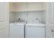 Stackable washer and dryer in a well-lit laundry closet at 1718 W Colter St # 195, Phoenix, AZ 85015