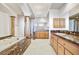 Elegant bathroom with granite countertops and a large soaking tub at 10914 E Cinder Cone Trl, Scottsdale, AZ 85262