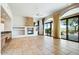 Spacious living room with a fireplace and sliding doors to patio at 10914 E Cinder Cone Trl, Scottsdale, AZ 85262