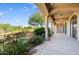 Spacious covered patio with scenic views and a relaxing atmosphere at 10914 E Cinder Cone Trl, Scottsdale, AZ 85262