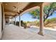 Extended covered patio offering stunning views and ample space at 10914 E Cinder Cone Trl, Scottsdale, AZ 85262