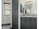 Bathroom vanity with granite countertop and dark grey cabinets at 28301 N 154Th St, Scottsdale, AZ 85262