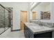 Bathroom boasts double sinks, granite counters, and tile shower at 28301 N 154Th St, Scottsdale, AZ 85262