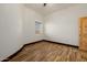 Bedroom with wood flooring and a window at 28301 N 154Th St, Scottsdale, AZ 85262